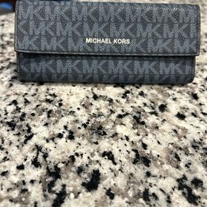 Michael Kors Navy Monogram Wallet. Excellent condition. Blue
